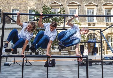 three people jumping