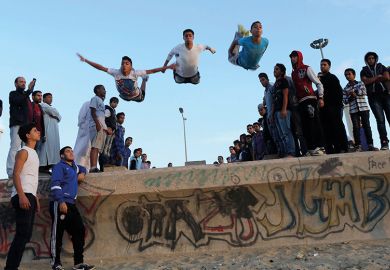 Young Libyans practise parkour on the beach in Benghazi  Young Libyans practise parkour on the beach in Benghazi