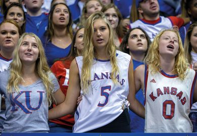 student fans of basketball team the Kansas Jayhawks  student fans of basketball team the Kansas Jayhawks
