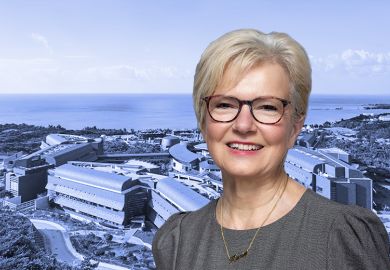 Karin Markides, outgoing president and chief executive of the Okinawa Institute of Science and Technology (OIST) with the OIST campus in the background