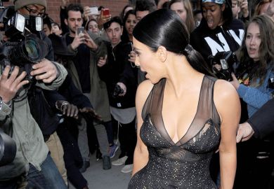 Kim Kardashian posing for photographers and fans Kim Kardashian posing for photographers and fans