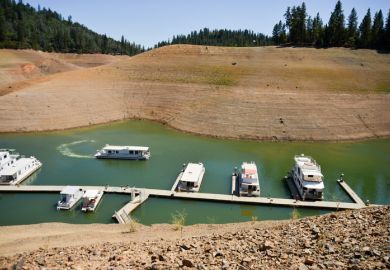 Lake Shasta, USA - August 17, 2014 California's lingering drought exposes the 180-200 foot drop in water levels. The state's largest reservoir is receding at an average of 4.9 inches per day. The 3-year-long drought is affecting tourism and boating recrea