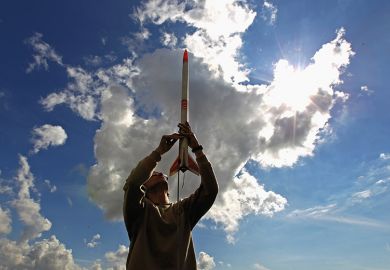Rocket being launched out of hand Rocket being launched out of hand