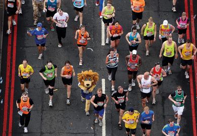 Runner in lion fancy-dress