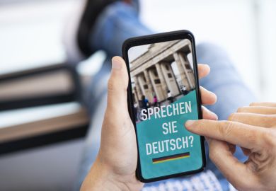 German language lesson on a smartphone German language lesson on a smartphone illustrating a story about language proficiency in Germany universities