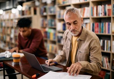 A mature student studying