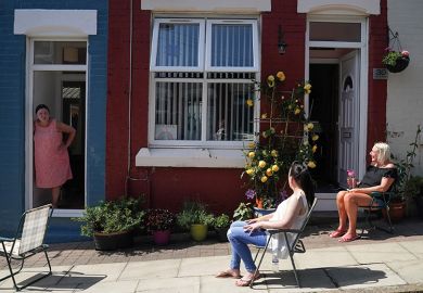 Women outside a house