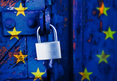 A padlocked door with the EU flag on it A padlocked door with the EU flag on it