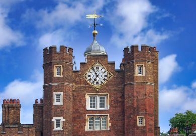 London, England - July 30, 2013 Close-up view of the tower of St. James Palace, with the clock and weather vane