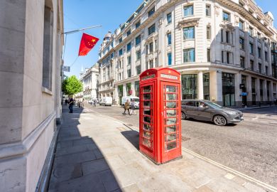 Bank of China in business centre with red telephone booth London, UK - June 26, 2018 Bank of china in business center architecture wide angle view with red telephone booth