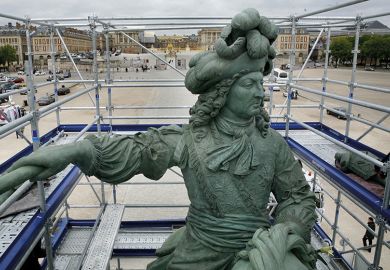 Scaffolding around sculpture