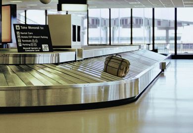 Luggage on airport carousel Luggage on airport carousel