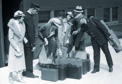 Train passengers identifying luggage for porter Train passengers identifying luggage for porter