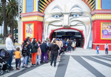 People queue at the entrance to Luna Park, Melbourne People queue at the entrance to Luna Park, Melbourne, symbolising widening access
