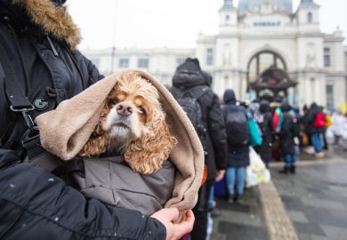 Lviv, Ukraine - March 7, 2022 Ukrainian refugees on Lviv railway station waiting for train to escape to Europe
