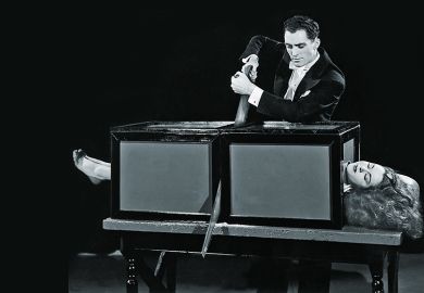 Magician saws woman in half