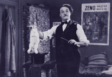 Magician pulls rabbit out of hat