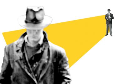 Male academic staring at student from distance