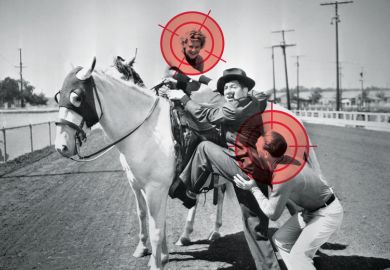 Man being helped to mount a white horse