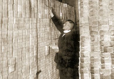 Man counting banknotes, Weimar Republic, Germany, 1923