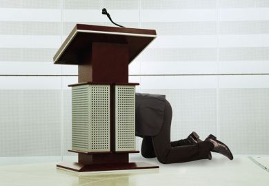 Man hiding behind podium Man hiding behind podium