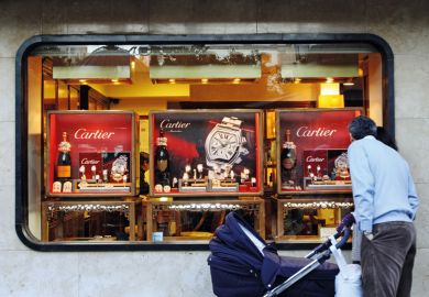 Man window shopping for Cartier watches, Córdoba, Spain