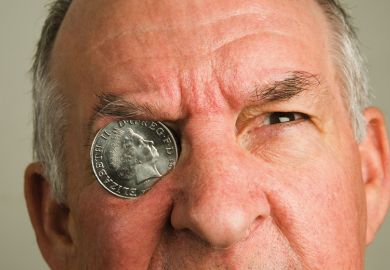 Man with coin monocle