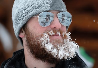 man with frozen beard, Lake Louise, Canada man with frozen beard, Lake Louise, Canada
