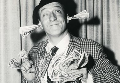 Smiling man with banknotes stuffed in ears and hands