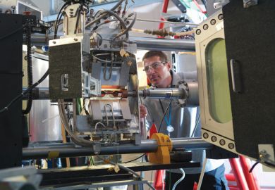 Man working at Synchrotron-light for Experimental Science and Applications in the Middle East (SESAME)