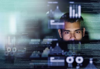 Man working with data on screen