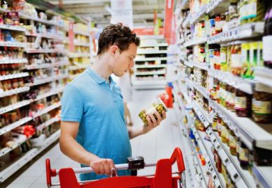 Man choosing in supermarket Man choosing in supermarket