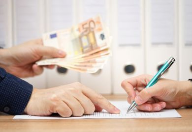 Man holding euros forcing woman to sign Man holding euros forcing woman to sign