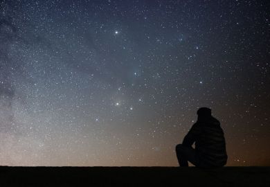 Man looking at the stars