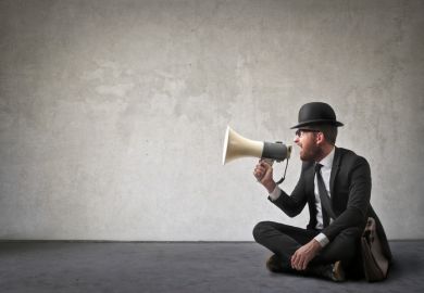 Man shouting into megaphone