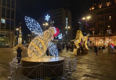 Manchester, United Kingdom - November 23, 2019 Christmas lights of the Manchester bee illuninating St Peters Square in Manchester city centre.