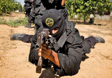 Armed man wearing balaclava Armed man wearing balaclava