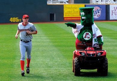 Mascot mocking baseball player