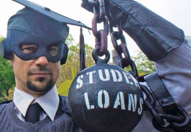 Masked man shackled by 'Student Loans' ball and chain