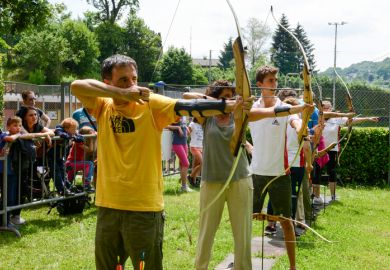 Massagno, Switzerland - 13 June 2016 - people who are learning to archery at Massagno on the italian part of Switzerland