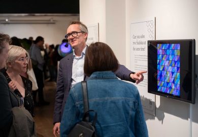 John Armstrong with guests at the It All Adds Up exhibition John Armstrong with guests at the It All Adds Up exhibition