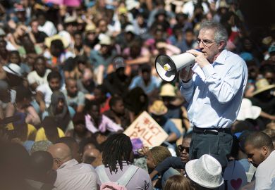 Vice Chancellor of the University of Cape Town (UCT) Max Price, addresses thousands of students at the university to illustrate  UCT ‘was a poisoned chalice’