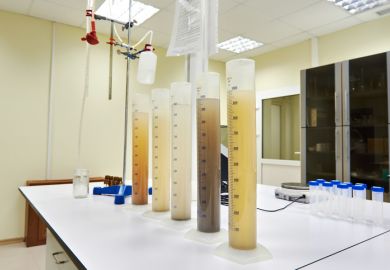 Measuring test tubes with different liquid in laboratory