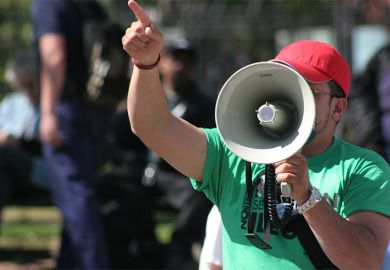 Man shouting into a megaphone
