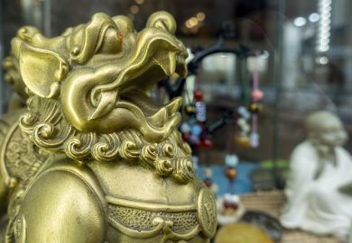 Melbourne, Australia - May 12, 2019 Chinese lion figurine. Chinatown shop along Little Bourke Street in the Central Business District (CBD) that sells oriental souvenirs.