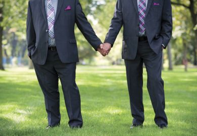 Men holding hands, same sex marriage