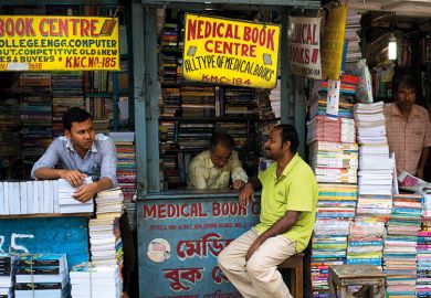 Men looking after book stalls, College Street, Kolkata, India