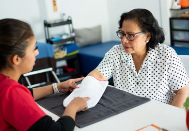A hispanic woman at a medical appointment A hispanic woman at a medical appointment