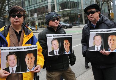 Protesters hold signs calling for the release of Canadian citizens Michael Spavor and Michael Kovrig outside British Columbia Superior Court in March 2019 Protesters hold signs calling for the release of Canadian citizens Michael Spavor and Michael Kovrig outside British Columbia Superior Court in March 2019