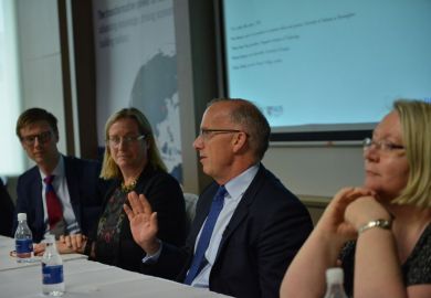 Michael Spence speaks at the World Academic Summit